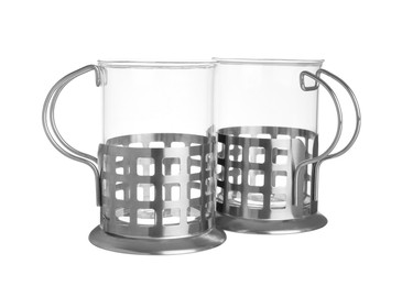 Photo of Traditional tea glass holders on white background