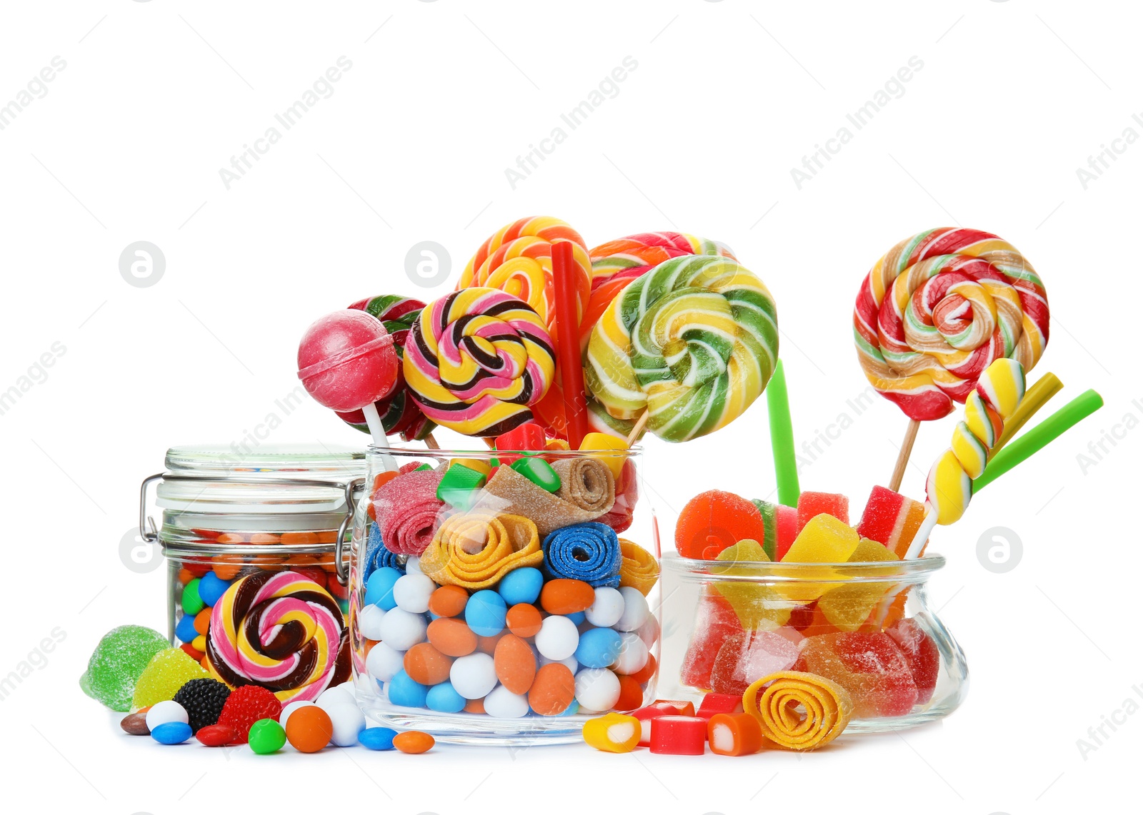 Photo of Composition with many different yummy candies on white background