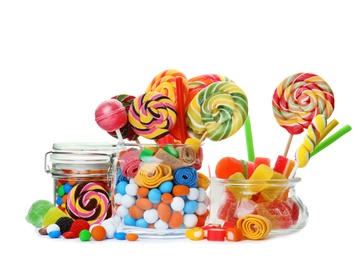 Composition with many different yummy candies on white background