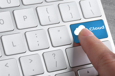 Image of Cloud technology. Woman pressing button on computer keyboard, closeup