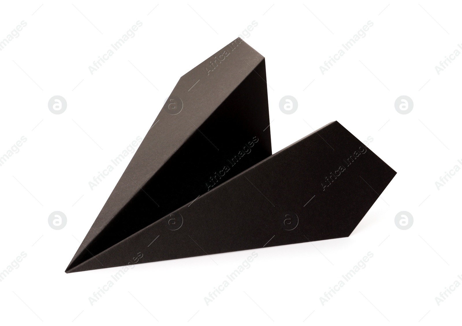 Photo of Handmade black paper plane isolated on white