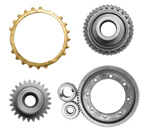 Image of Set with different stainless steel gears on white background, top view