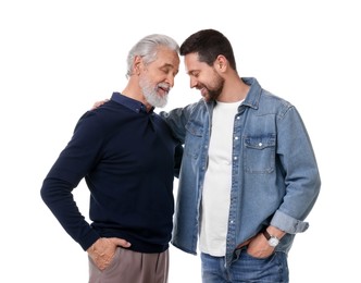 Happy son and his dad on white background