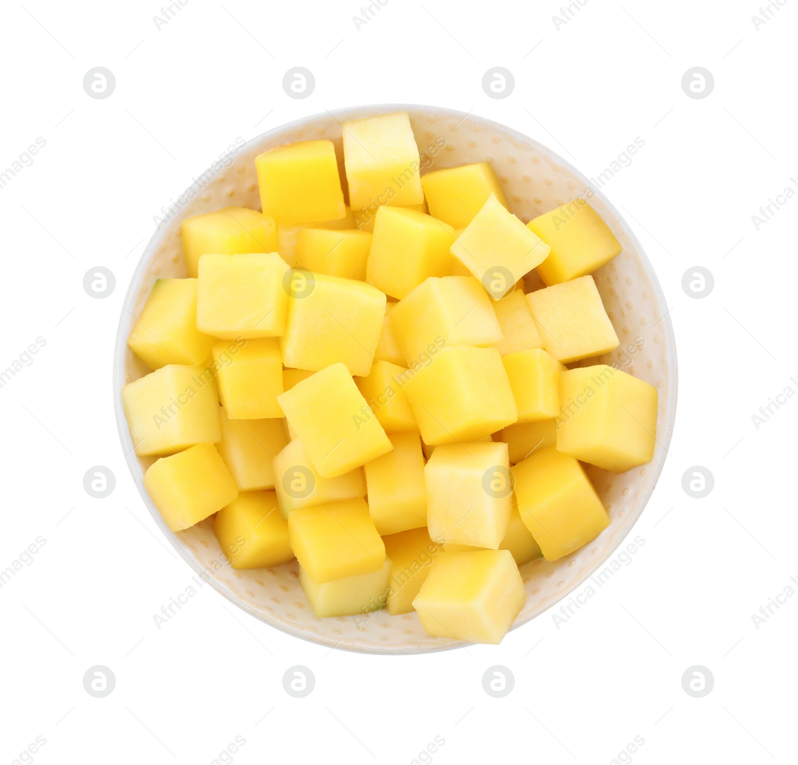 Photo of Tasty mango cubes in ceramic bowl isolated on white, top view