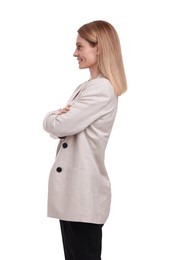 Photo of Beautiful happy businesswoman crossing arms on white background