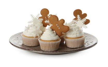 Photo of Tasty Christmas cupcakes with snowflakes and gingerbread men on white background