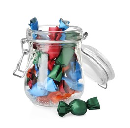 Photo of Glass jar with candies in colorful wrappers isolated on white