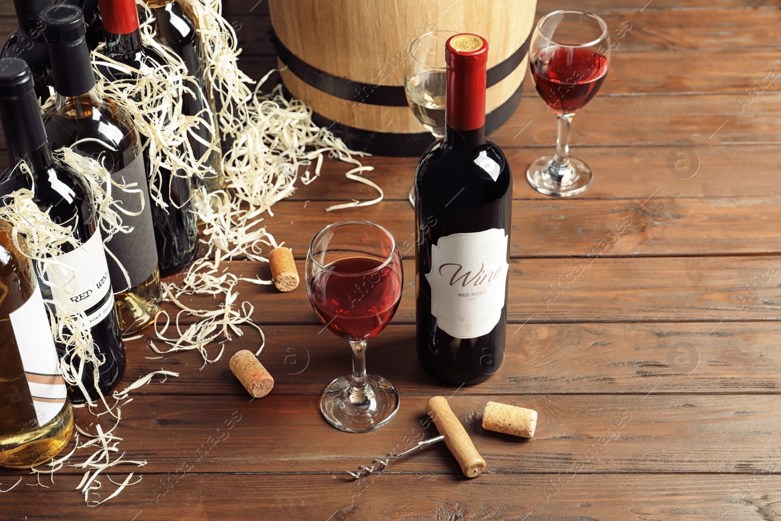 Photo of Composition with delicious red wine on wooden table