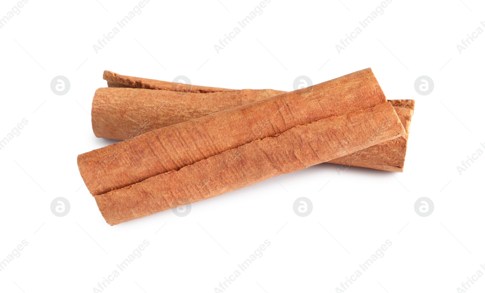 Photo of Two aromatic cinnamon sticks isolated on white