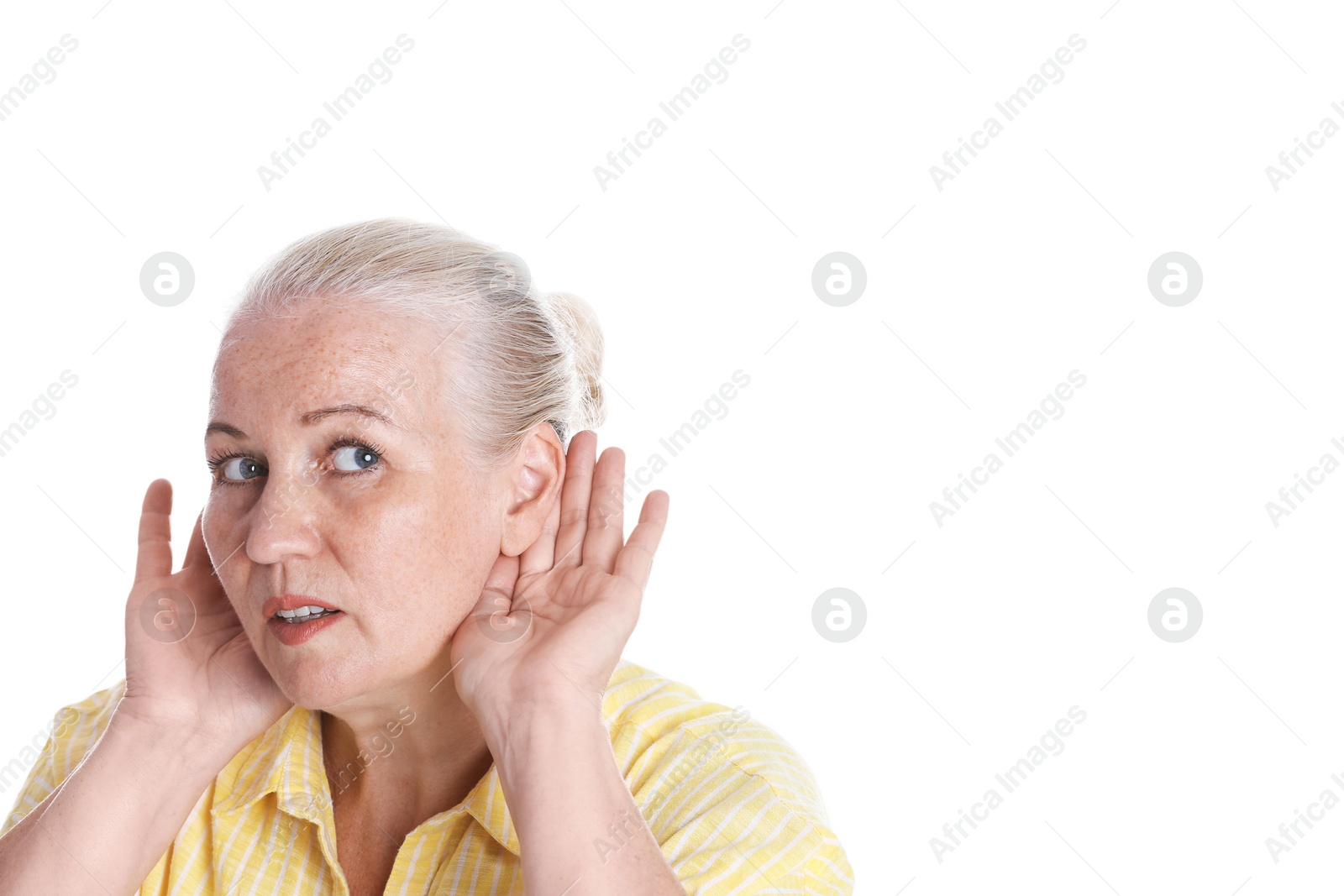 Photo of Mature woman with hearing problem on white background