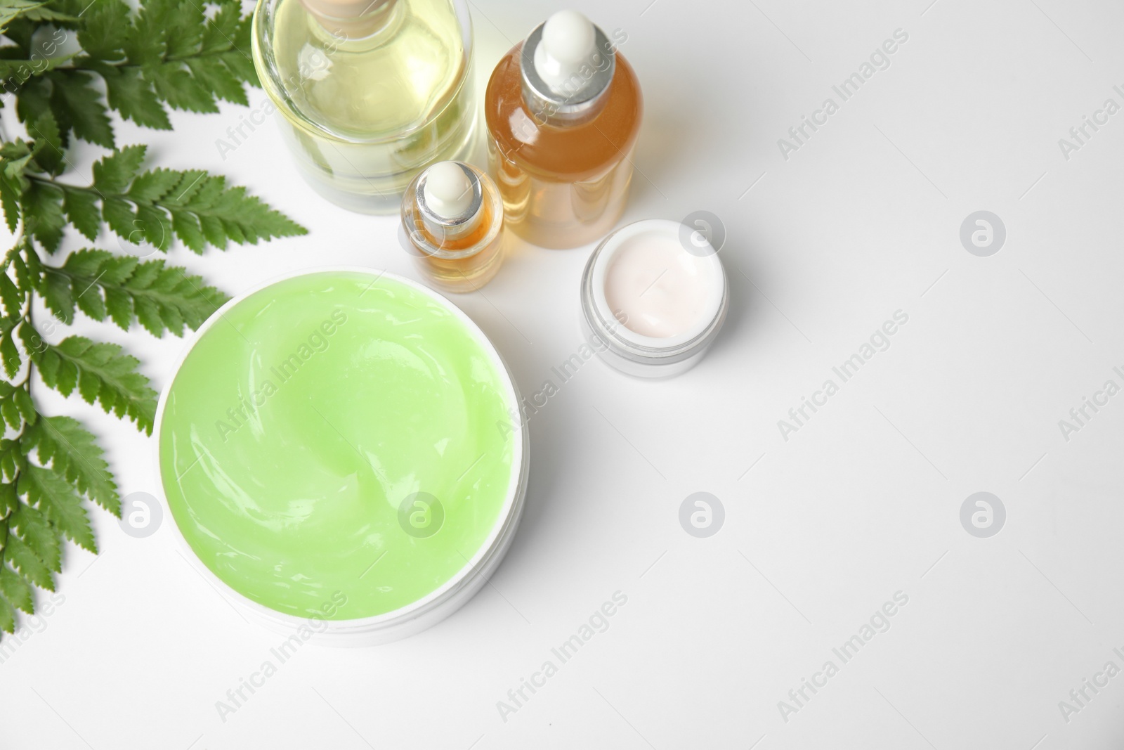 Photo of Flat lay composition with different body care products and space for text on white background