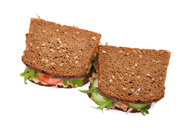 Photo of Delicious sandwiches with tuna and vegetables on white background