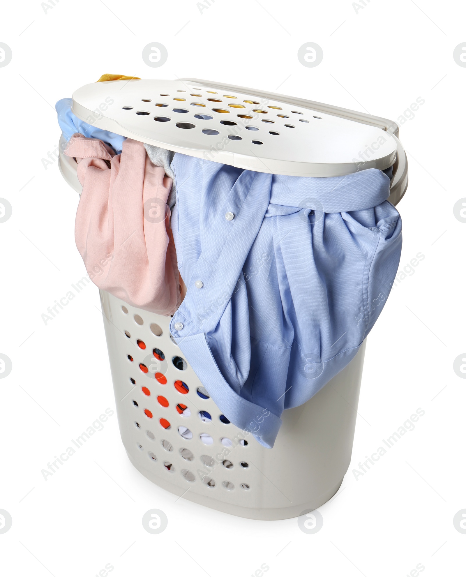 Photo of Plastic laundry basket full of clothes isolated on white