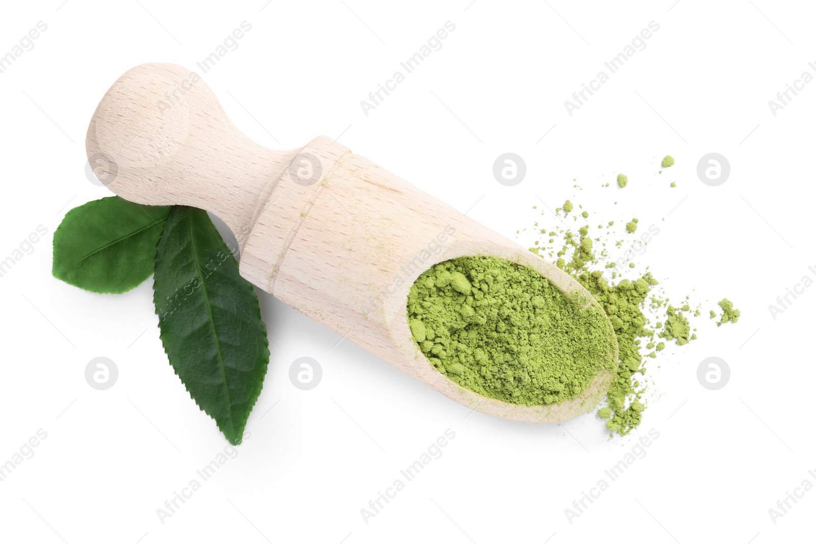 Photo of Leaves and scoop with matcha powder isolated on white, top view