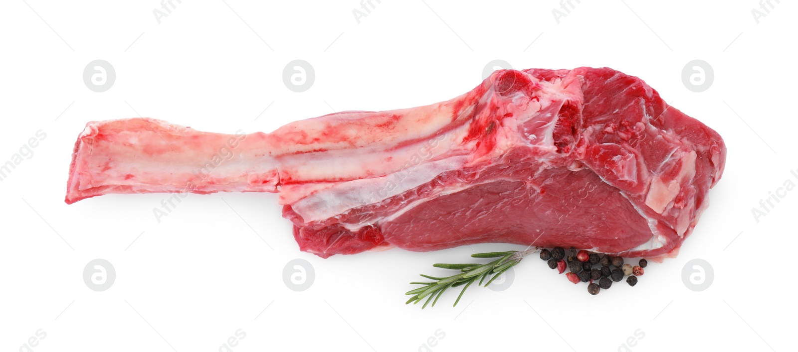 Photo of Piece of raw beef meat and spices isolated on white