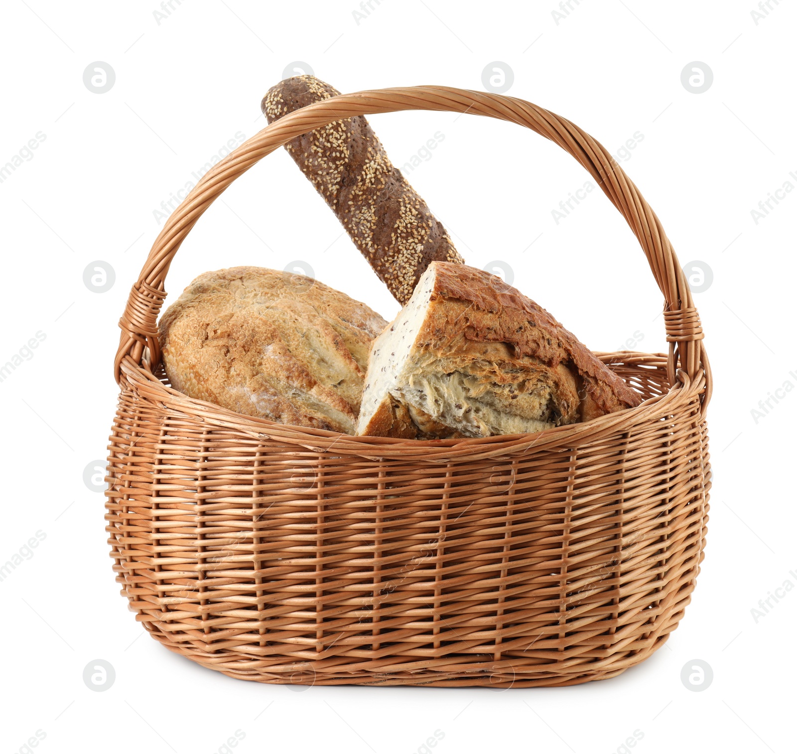 Photo of Wicker basket with different types of fresh bread isolated on white