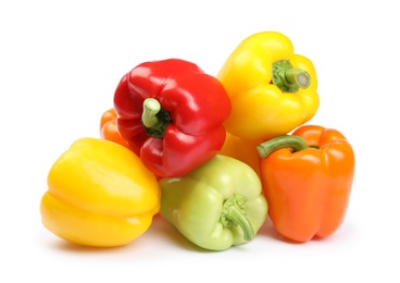 Fresh ripe bell peppers on white background