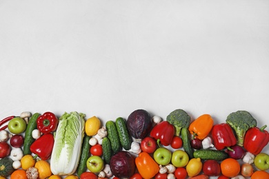 Photo of Variety of fresh delicious vegetables and fruits on table, flat lay. Space for text