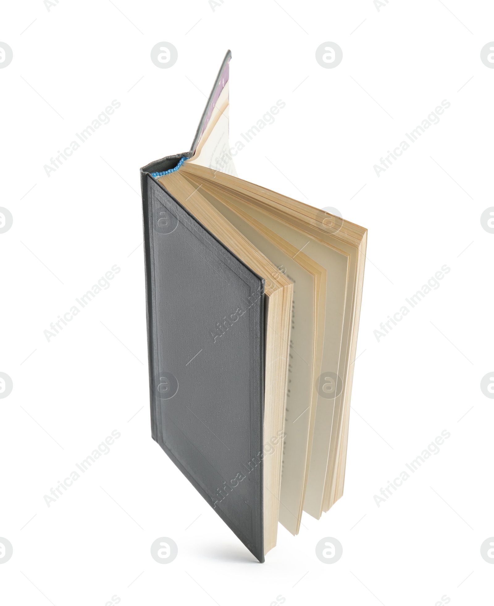 Photo of Open old hardcover book isolated on white