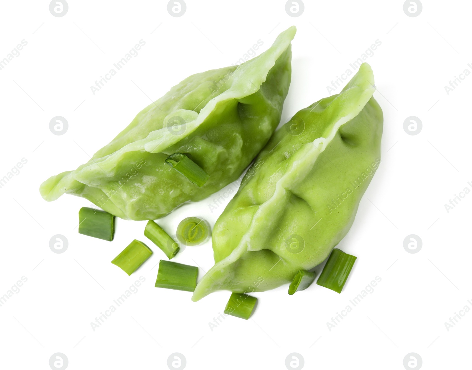 Photo of Two delicious green dumplings (gyozas) and onion isolated on white, top view