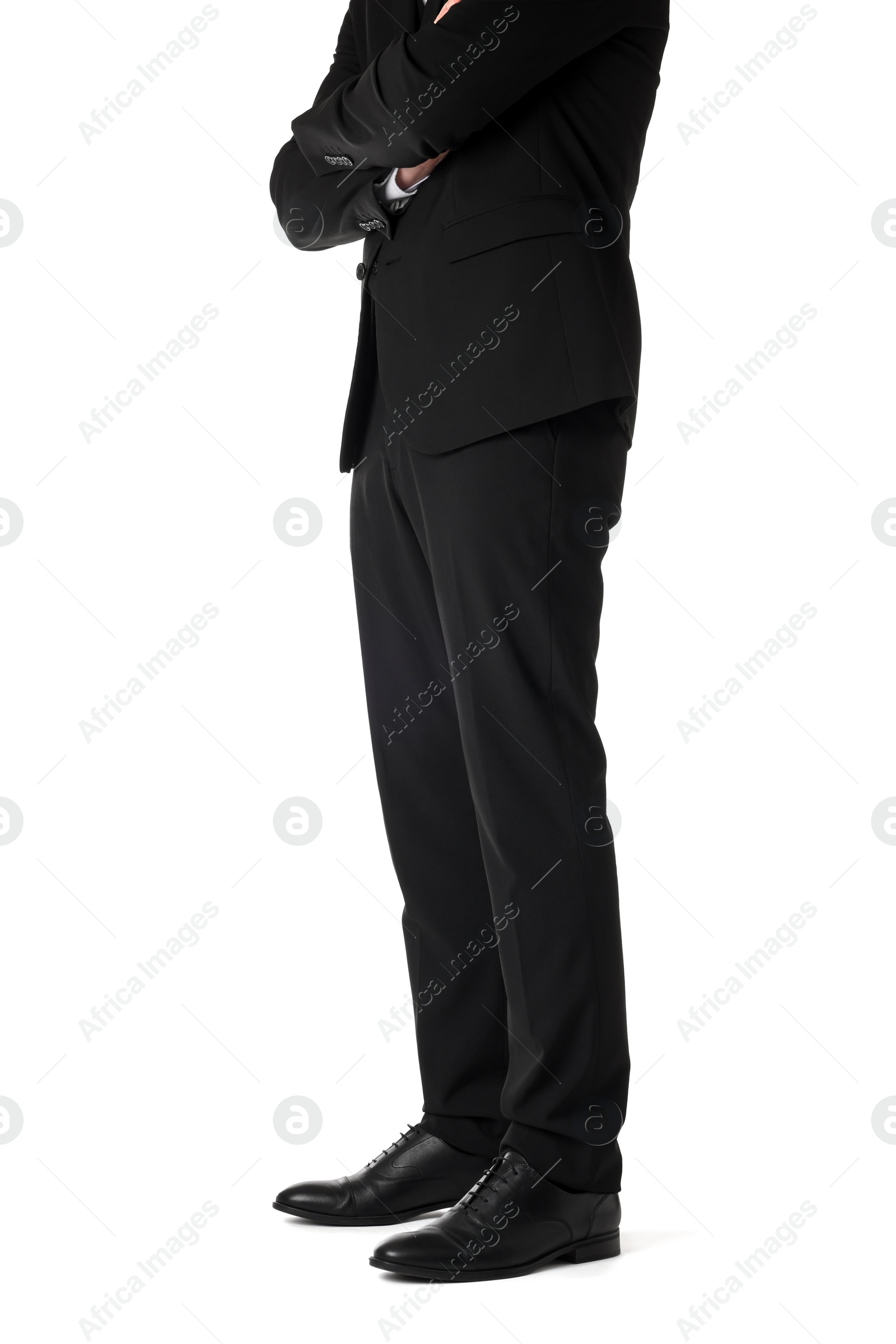 Photo of Businessman with crossed arms on white background, closeup