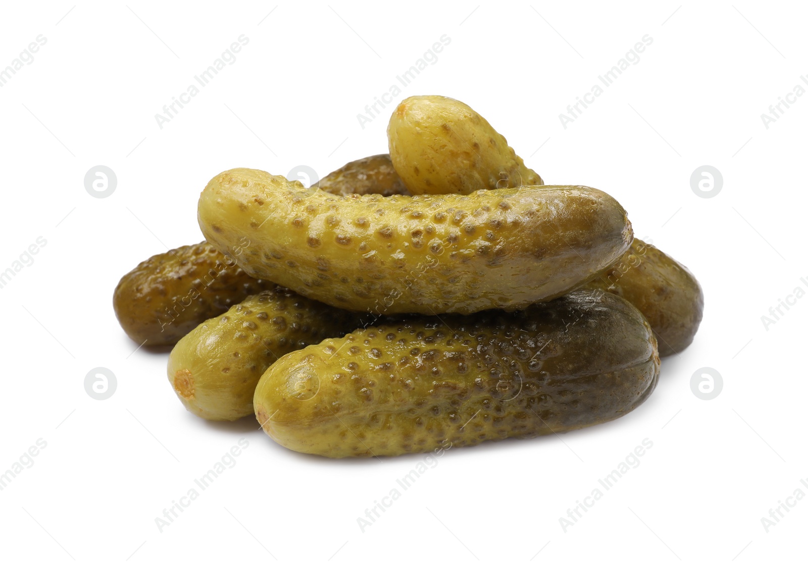 Photo of Pile of tasty pickled cucumbers isolated on white