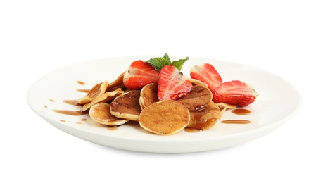 Plate with cereal pancakes and strawberries isolated on white