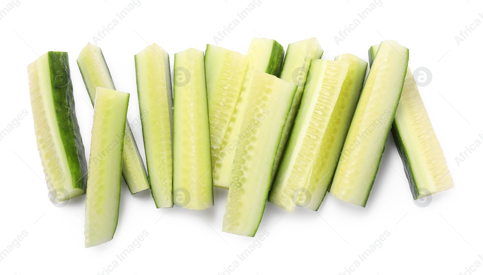 Photo of Pieces of fresh cucumber isolated on white, top view