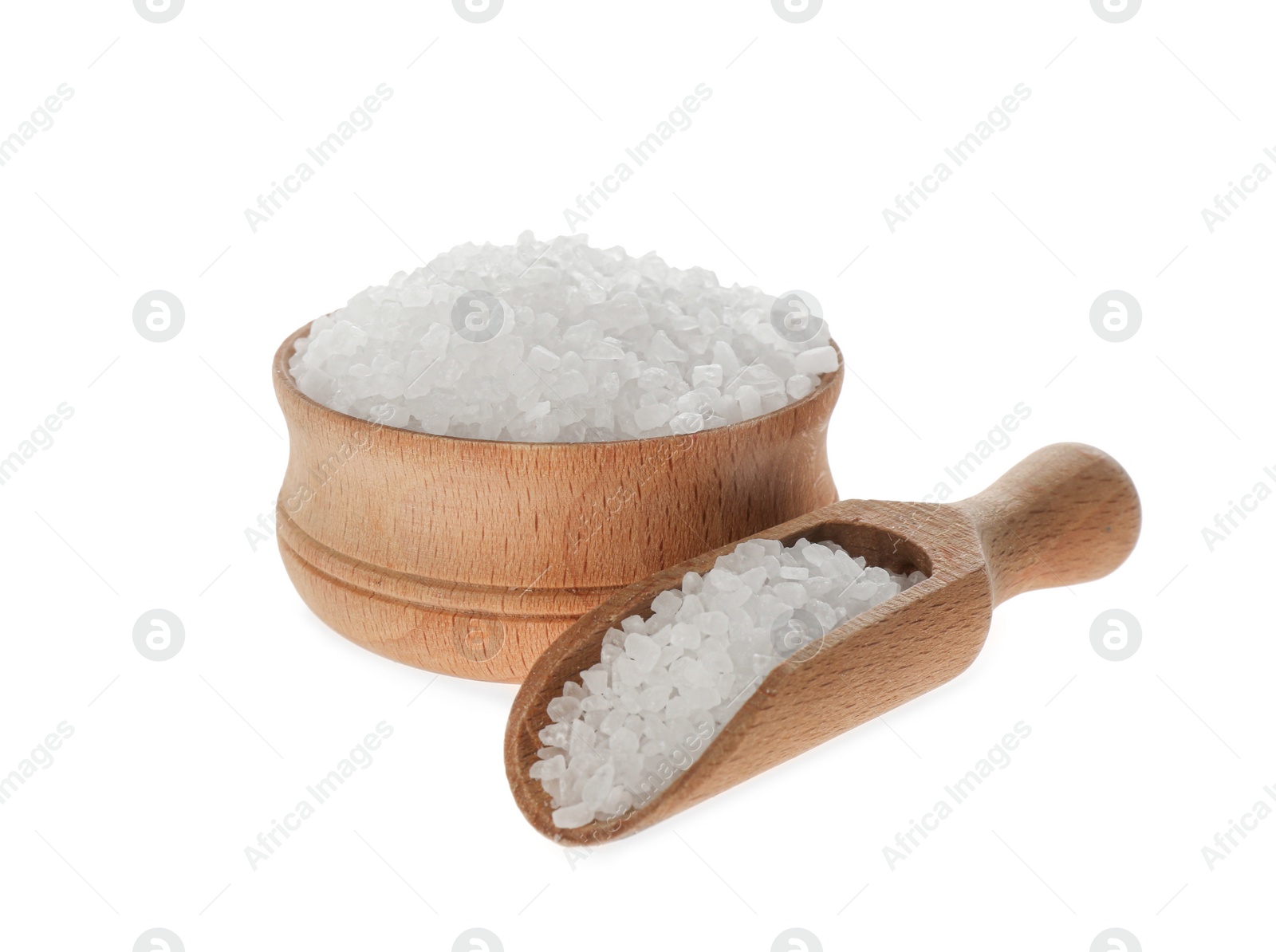 Photo of Wooden scoop and bowl with salt isolated on white