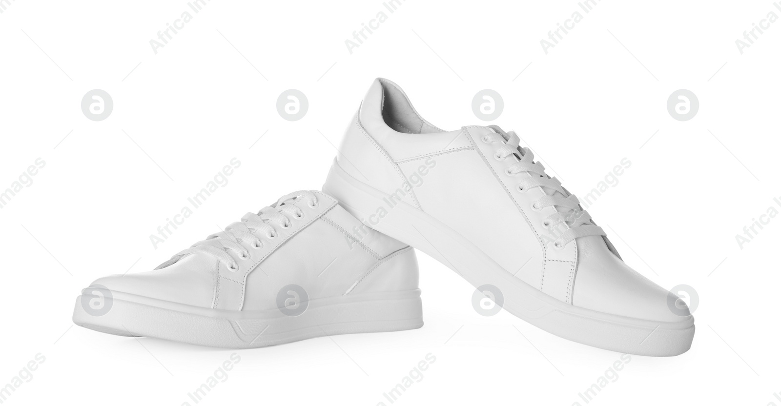 Photo of Pair of stylish sneakers isolated on white