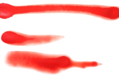 Lines drawn by red spray paint on white background