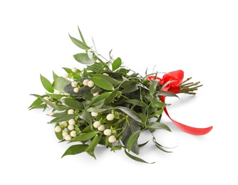 Photo of Mistletoe bunch with red bow isolated on white. Traditional Christmas decor