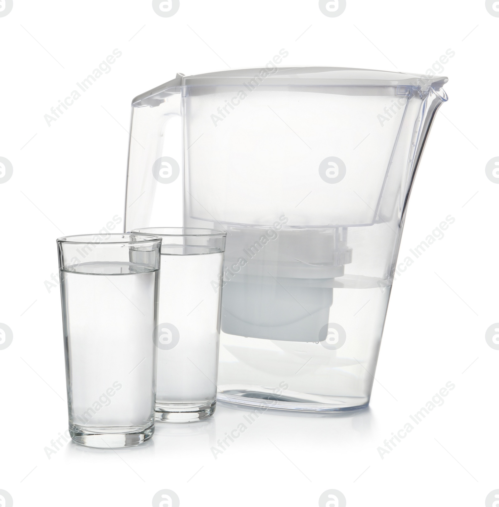 Photo of Filter jug and glasses with purified water on white background