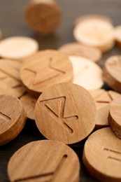 Photo of Pile of wooden runes as background, closeup view