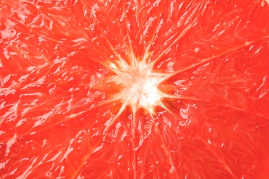 Texture of fresh ripe grapefruit, closeup view