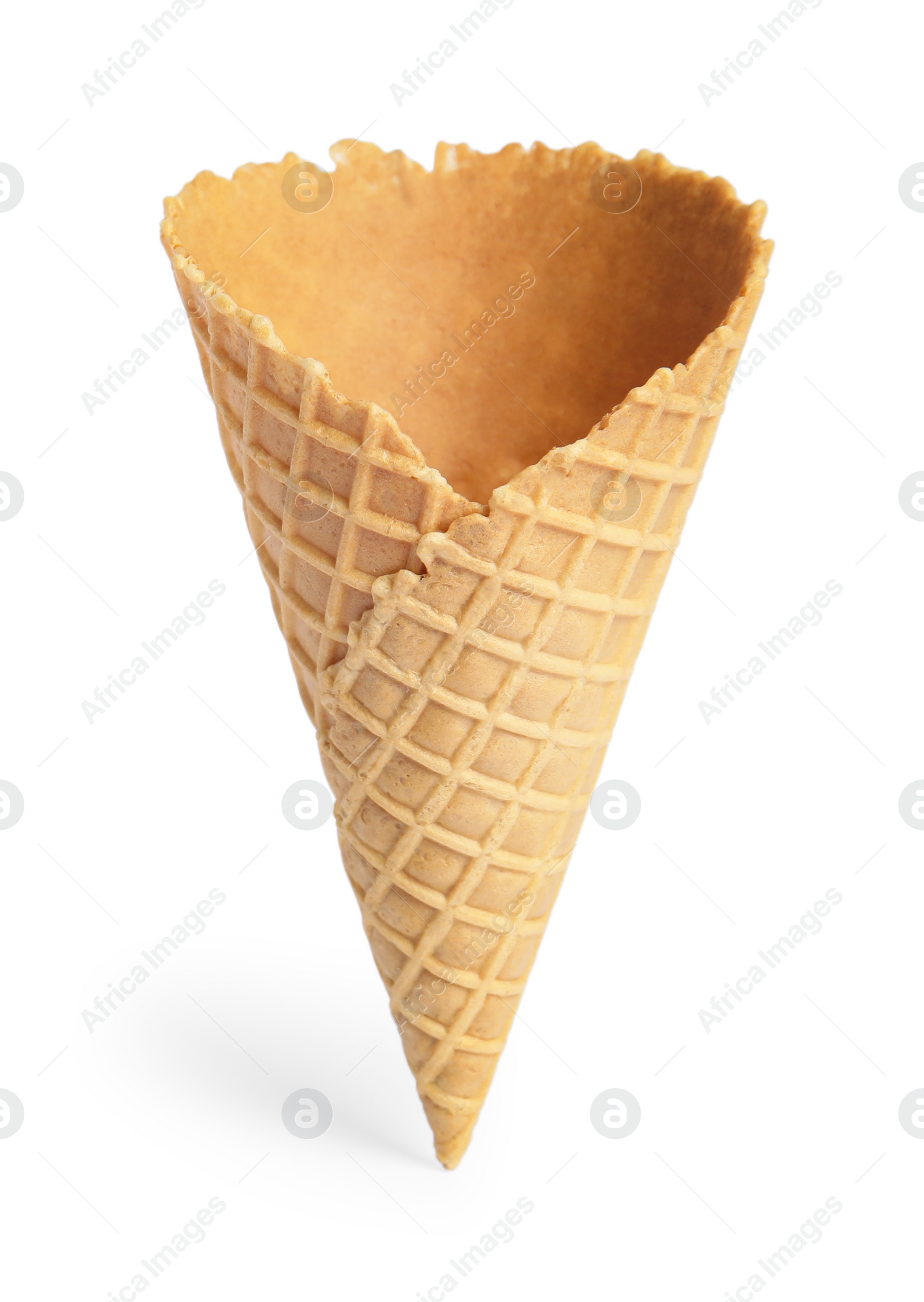 Photo of Empty wafer ice cream cone on white background