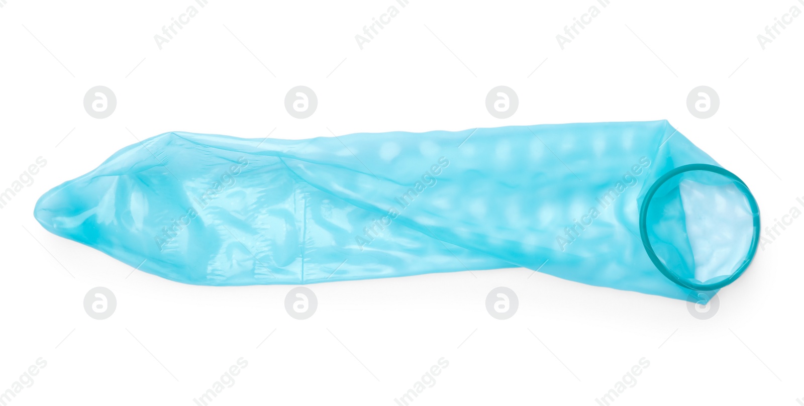 Photo of Blue used condom on white background. Safe sex concept