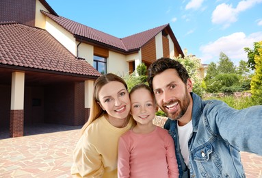 Image of Happy family with child taking selfie near house