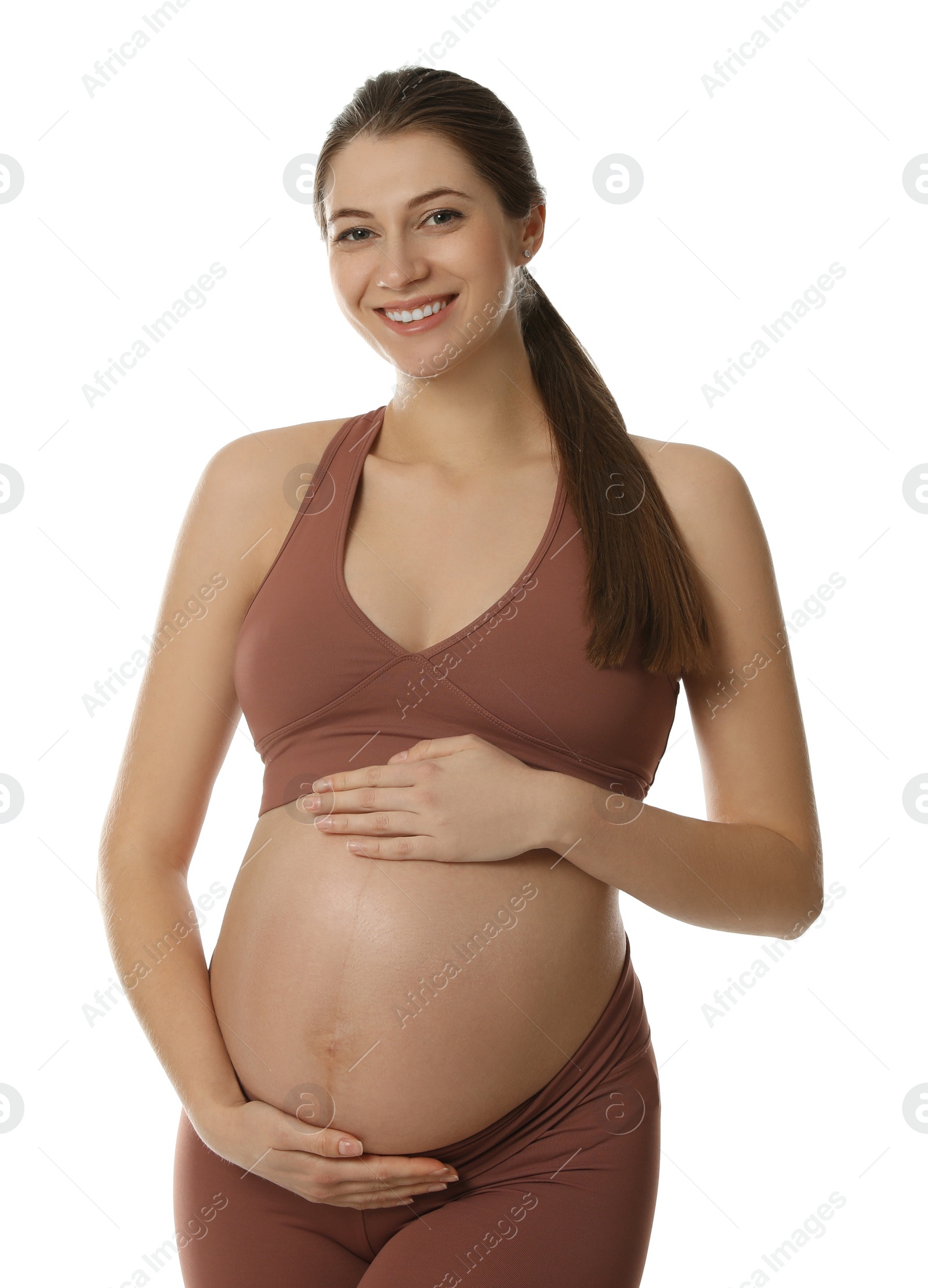 Photo of Happy young pregnant woman on white background