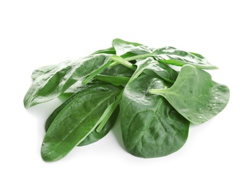 Heap of fresh green healthy baby spinach leaves isolated on white