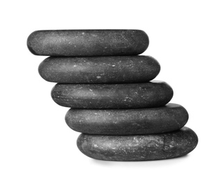 Stack of spa stones on white background