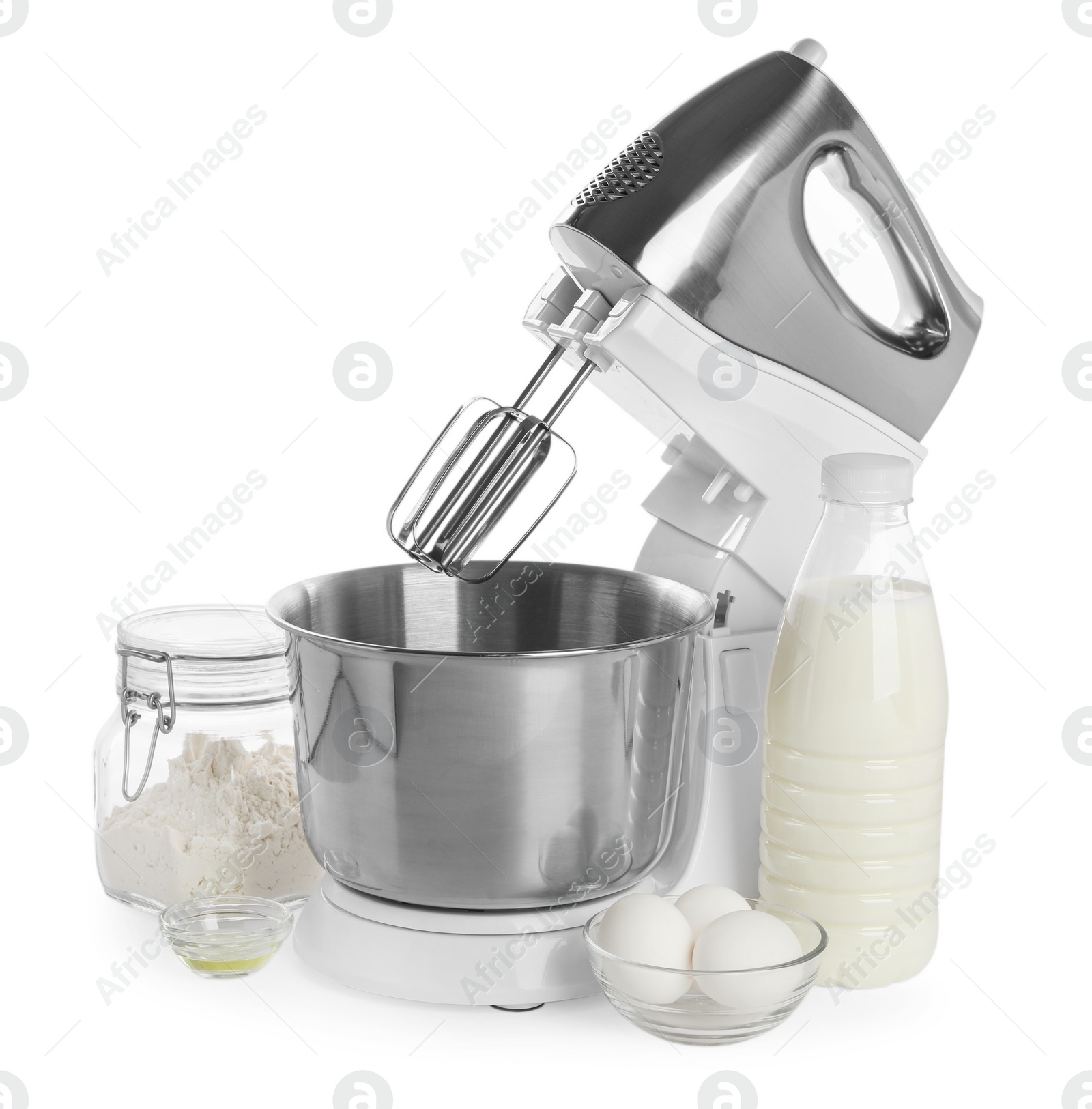 Photo of Stand mixer and different ingredients for dough isolated on white