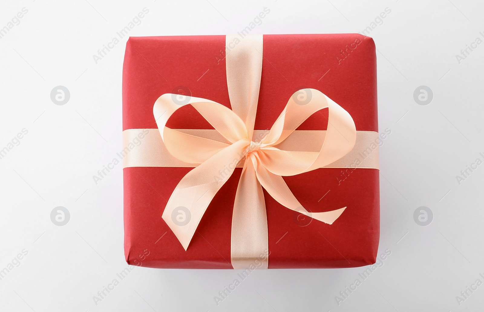 Photo of Beautiful gift box with ribbon on white background