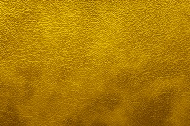 Image of Golden textured surface as background, closeup view