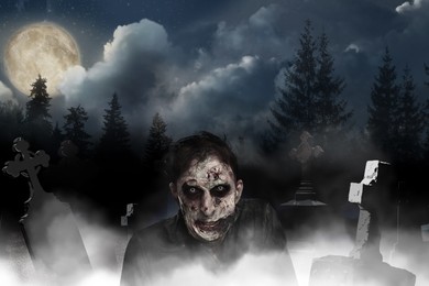 Image of Scary zombie at misty cemetery under full moon. Halloween monster