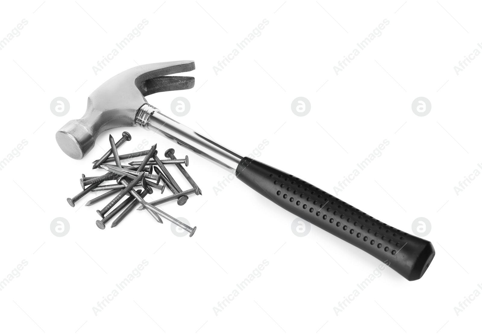 Photo of Hammer and metal nails on white background