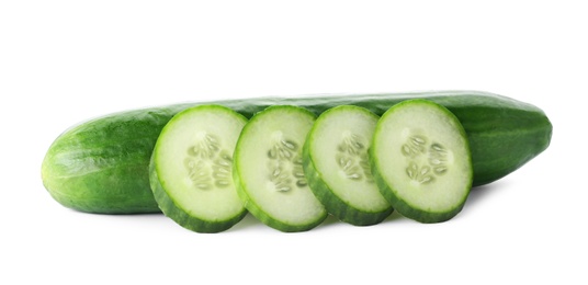 Photo of Whole and sliced fresh cucumbers on white background