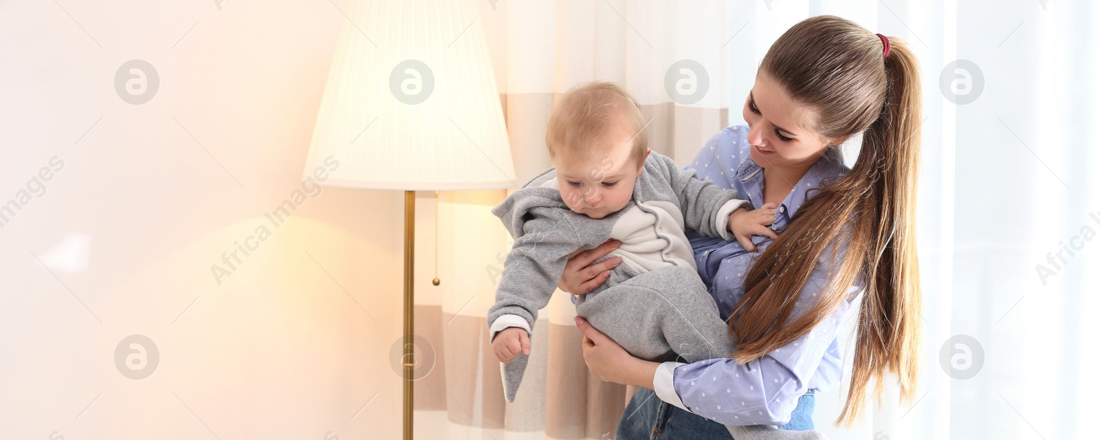 Image of Teen nanny with cute little baby at home, space for text. Banner design 