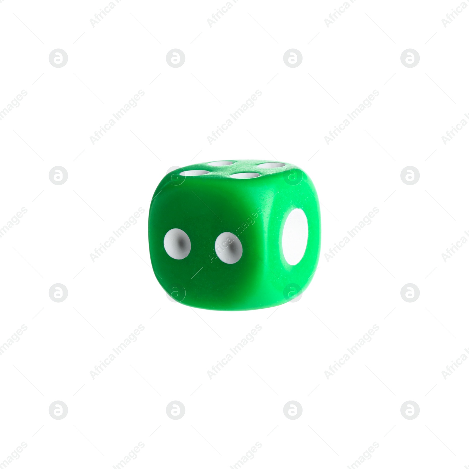 Photo of One green game dice isolated on white