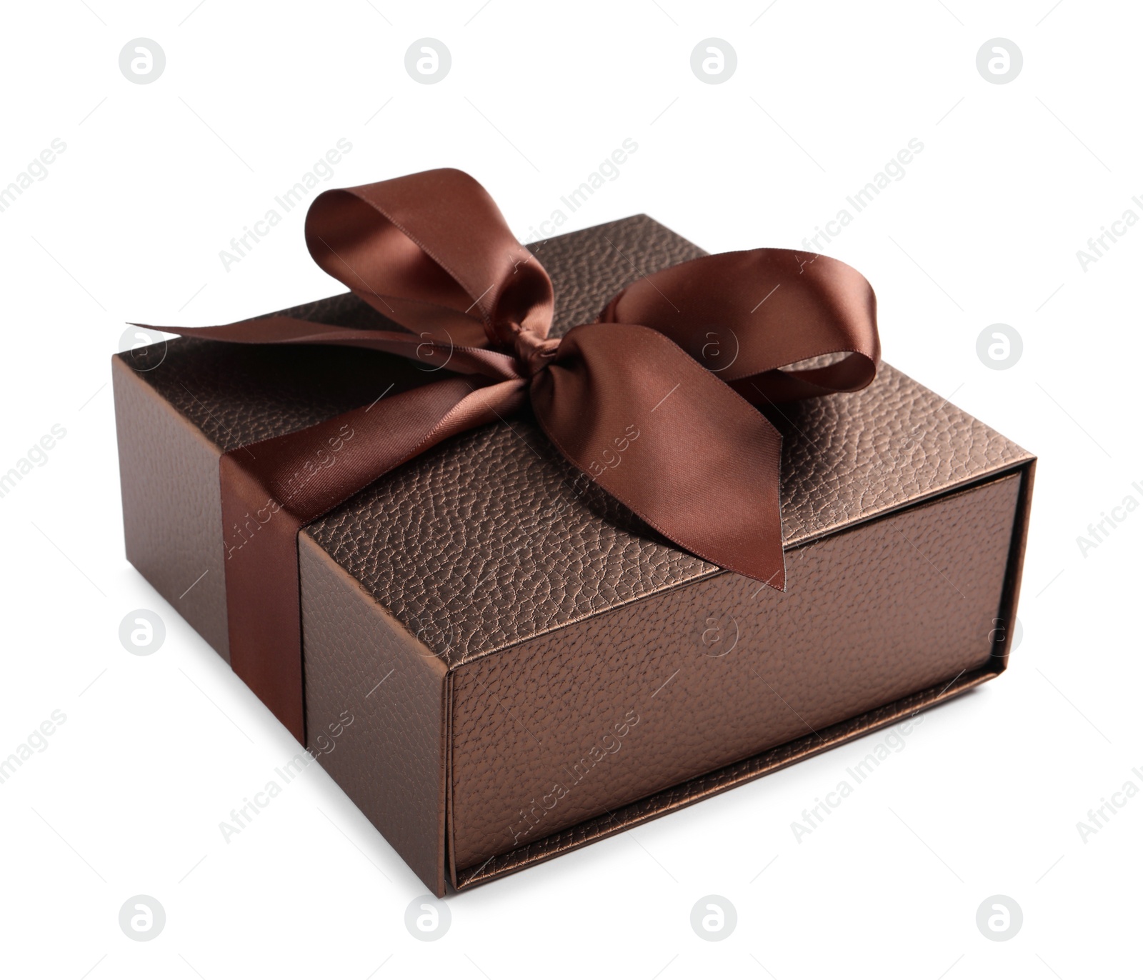 Photo of Brown gift box decorated with satin ribbon and bow on white background